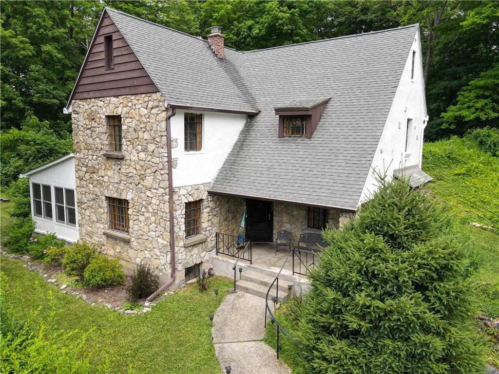 207 Rochdale Road Poughkeepsie, NY 12603 - Photo 1 of 1 View of front of property with a front lawn