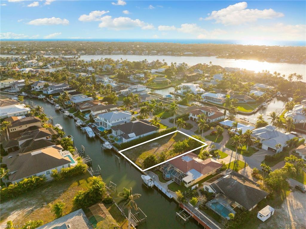 2165 Tarpon Road Naples, FL 34102 - Photo 2 of 14 an aerial view of residential houses with outdoor space