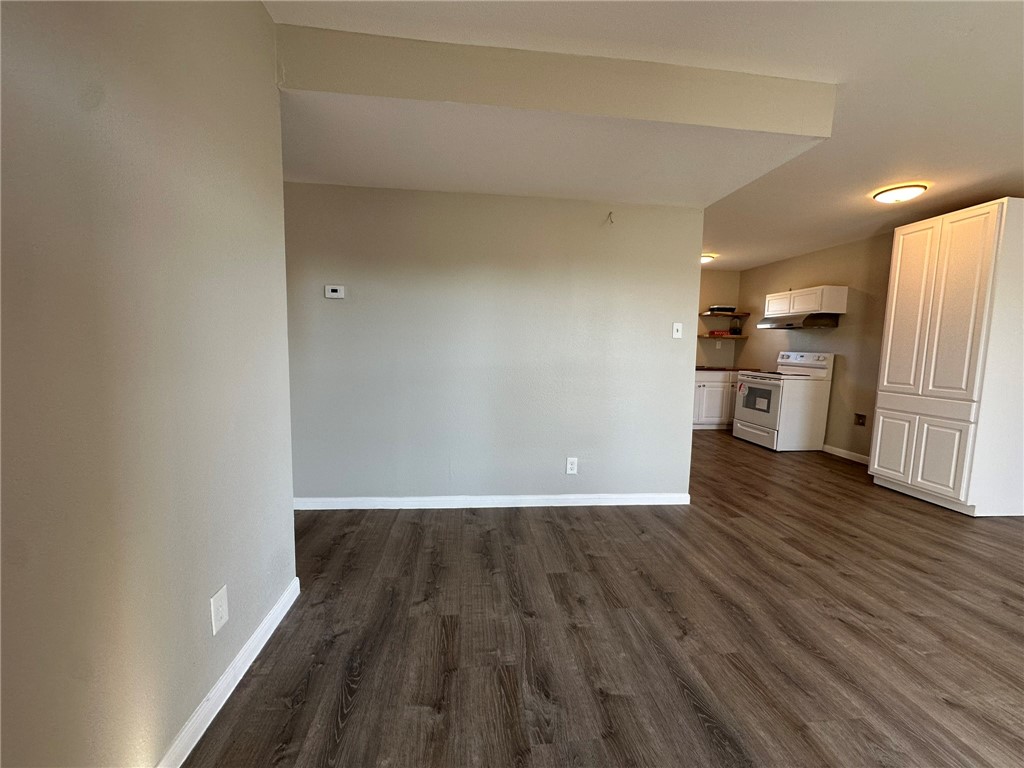 3152 Meadow Lane Robstown, TX 78380 - Photo 3 of 40 a view of a kitchen with wooden floor and a sink