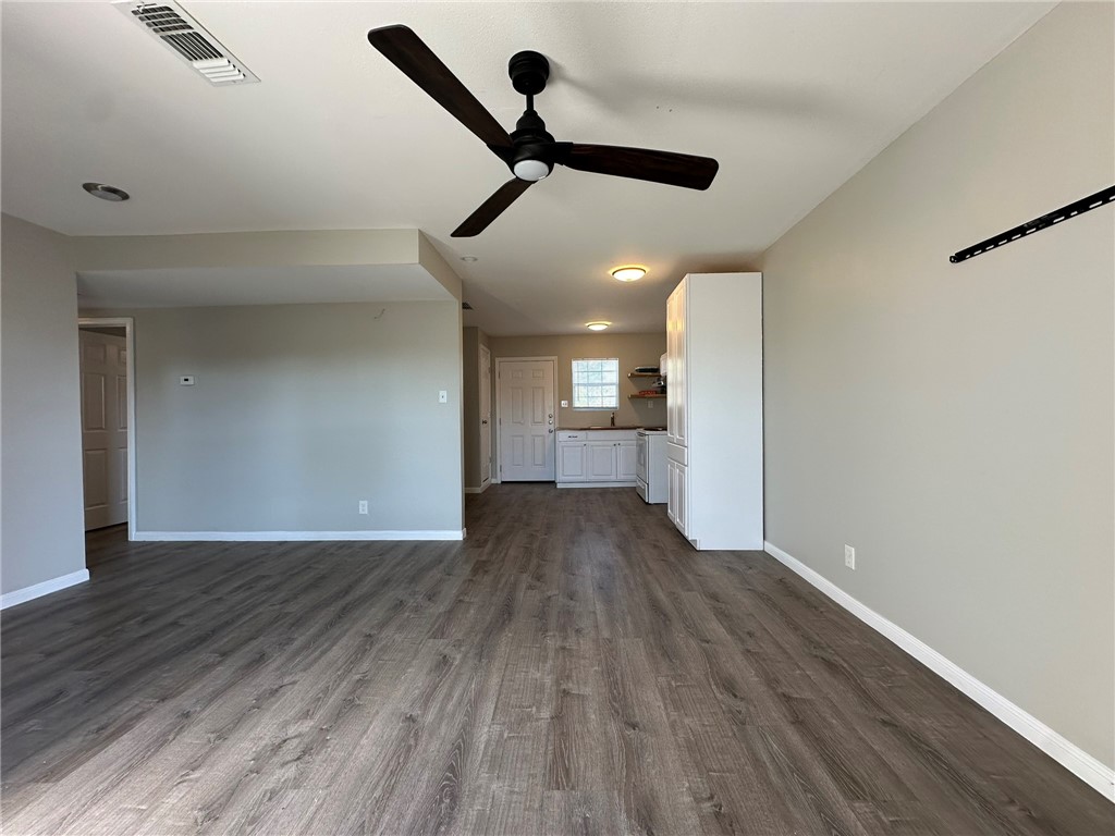 3152 Meadow Lane Robstown, TX 78380 - Photo 5 of 40 a view of empty room with wooden floor