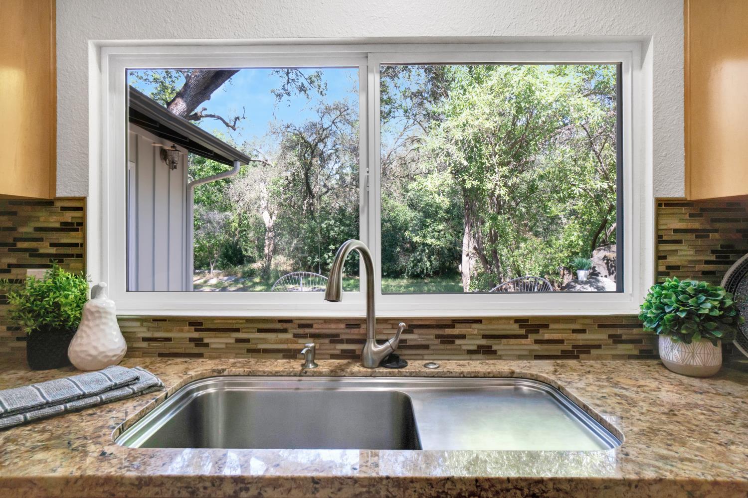 6299 Horseshoe Bar Road Loomis, CA 95650 - Photo 9 of 43 a sink and a window