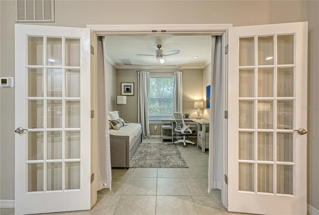 5420 Cicerone Street, Unit 101 Sarasota, FL 34238 - Photo 7 of 40 a view of a entryway door with living room
