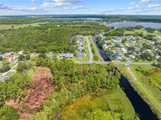 a view of residential houses with outdoor space