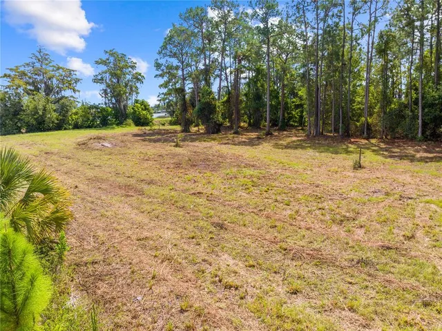 a view of swimming pool with an outdoor space and seating area