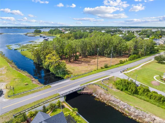 a view of a swimming pool with a yard