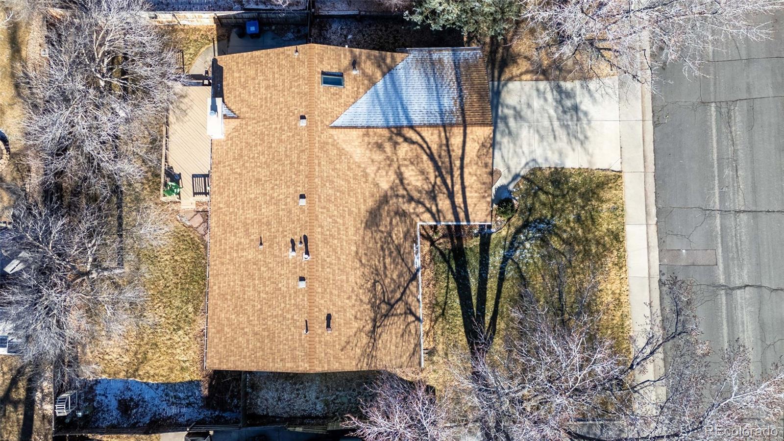 8205 Dudley Way Arvada, CO 80005 - Photo 39 of 44 a view of a yard with wooden fence