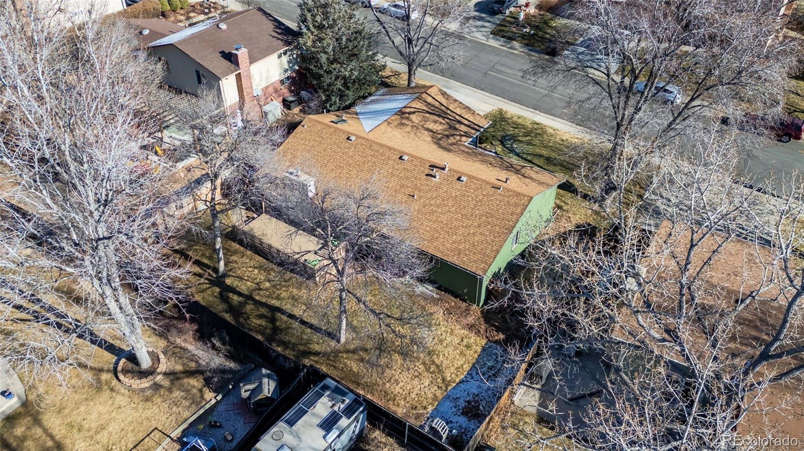 8205 Dudley Way Arvada, CO 80005 - Photo 40 of 44 an aerial view of a house with a yard