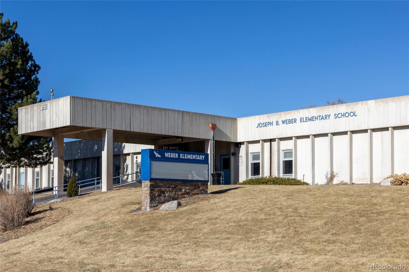 8205 Dudley Way Arvada, CO 80005 - Photo 41 of 44 a view of a chairs and table in a room