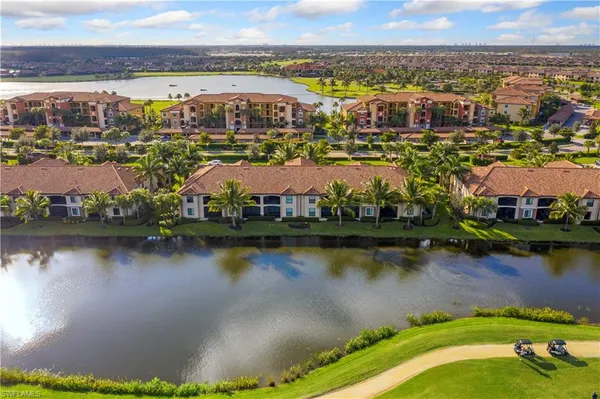 an aerial view of a city with lawn chairs