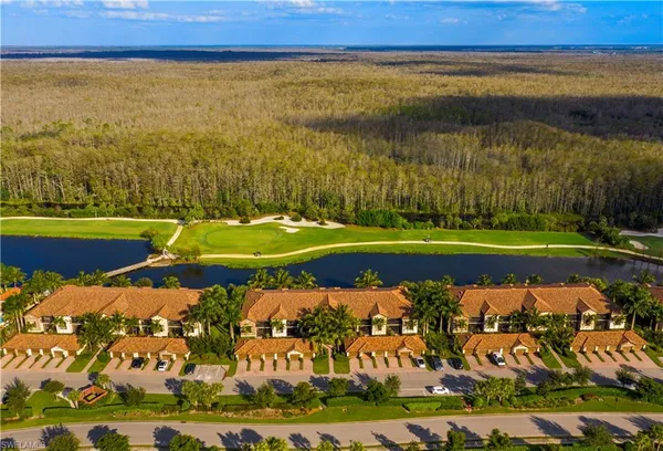 a view of a lake with a yard