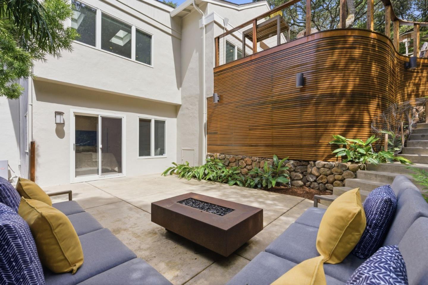 2884 Roland Avenue San Carlos, CA 94070 - Photo 10 of 27 a view of a patio with couches table and chairs and potted plants