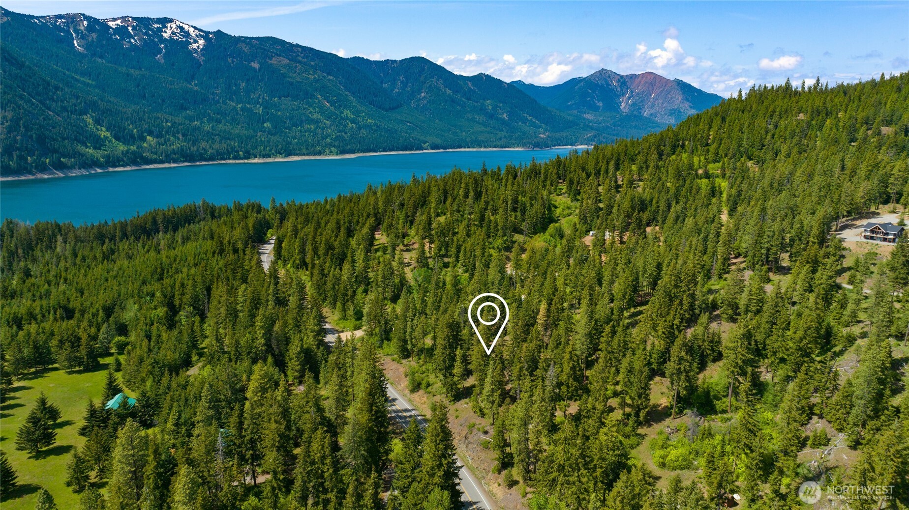 11 Salmon La Sac Road Ronald, WA 98940 - Photo 6 of 8 a view of a lush green forest with mountains in the background