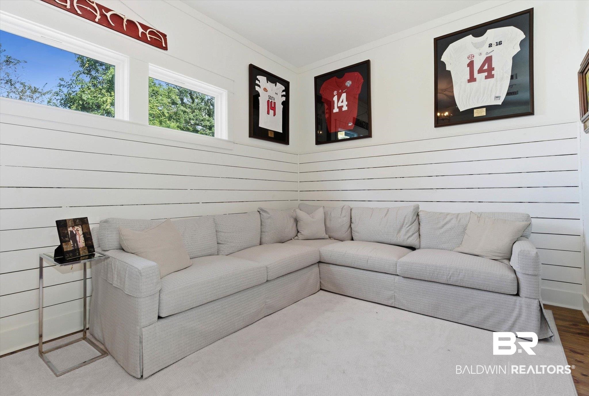 3704 Stein Street Mobile, AL 36608 - Photo 19 of 37 Living area with crown molding, wooden walls, and wood finished floors