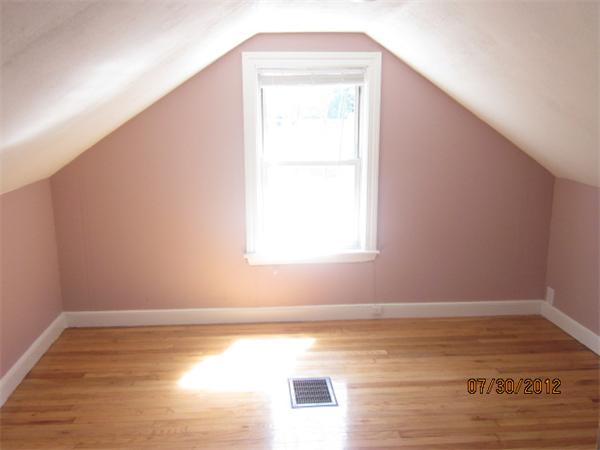 21 Arcadia Road Billerica, MA 01821 - Photo 8 of 10 a view of empty room with wooden floor