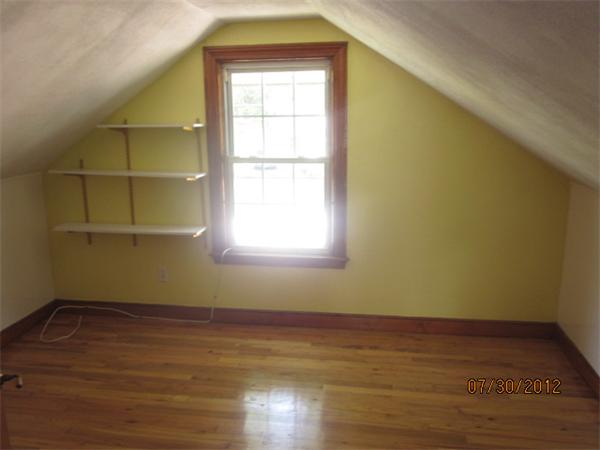 21 Arcadia Road Billerica, MA 01821 - Photo 9 of 10 an empty room with wooden floor and windows