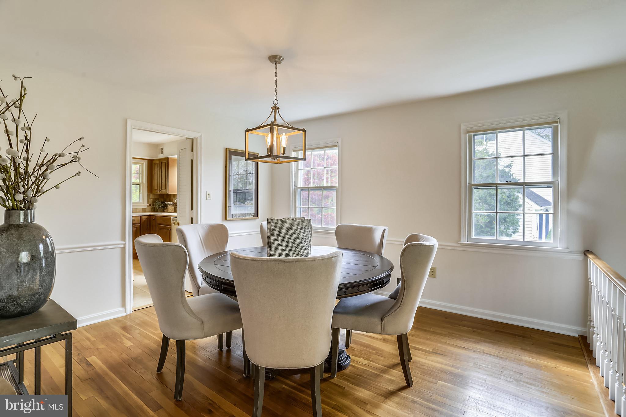 13624 Middlevale Lane Silver Spring, MD 20906 - Photo 15 of 60 Separate Dining Room with Modern Light Fixture