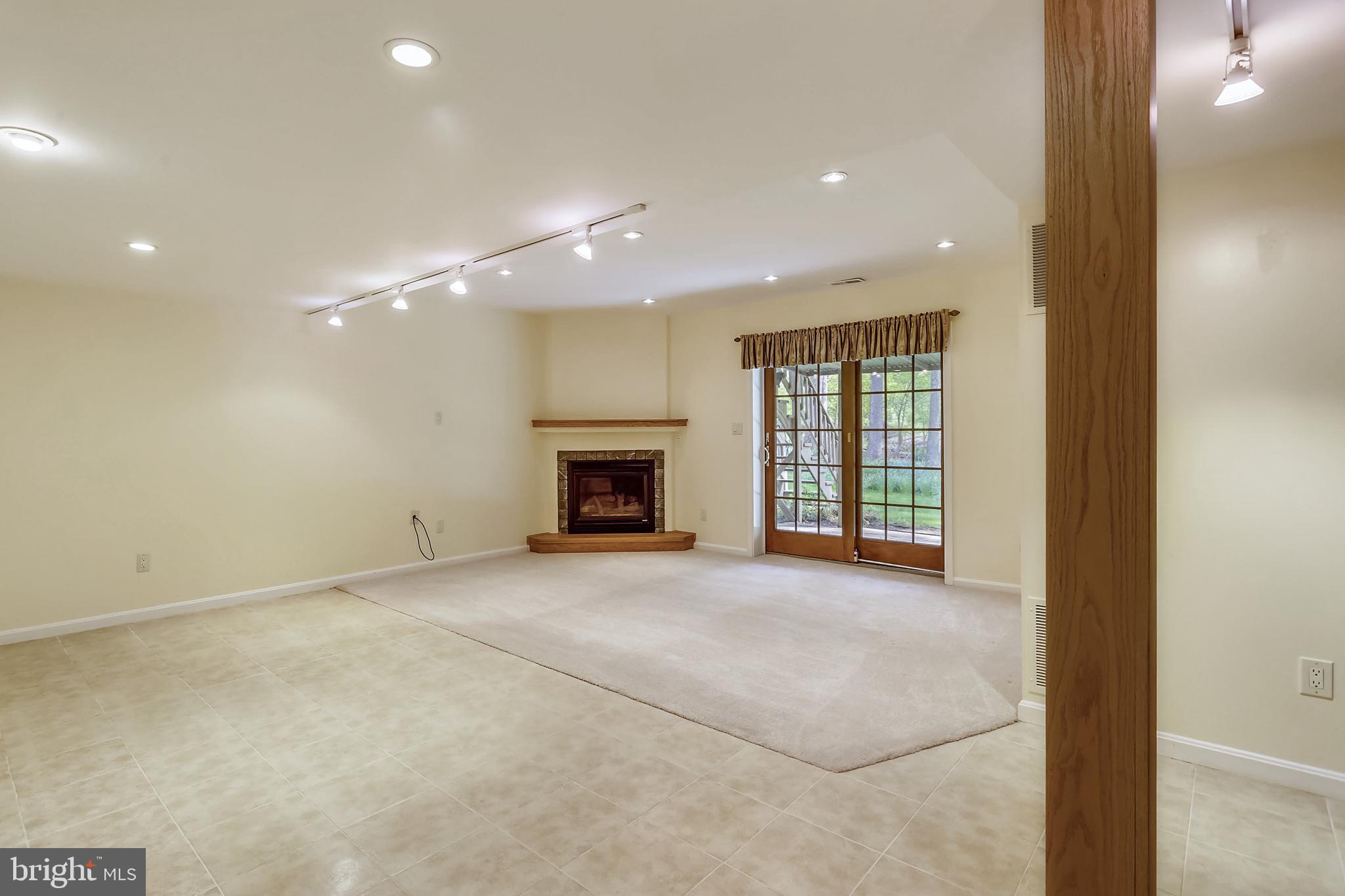 13624 Middlevale Lane Silver Spring, MD 20906 - Photo 26 of 60 Finished Lower Level with Second Fireplace (Gas)