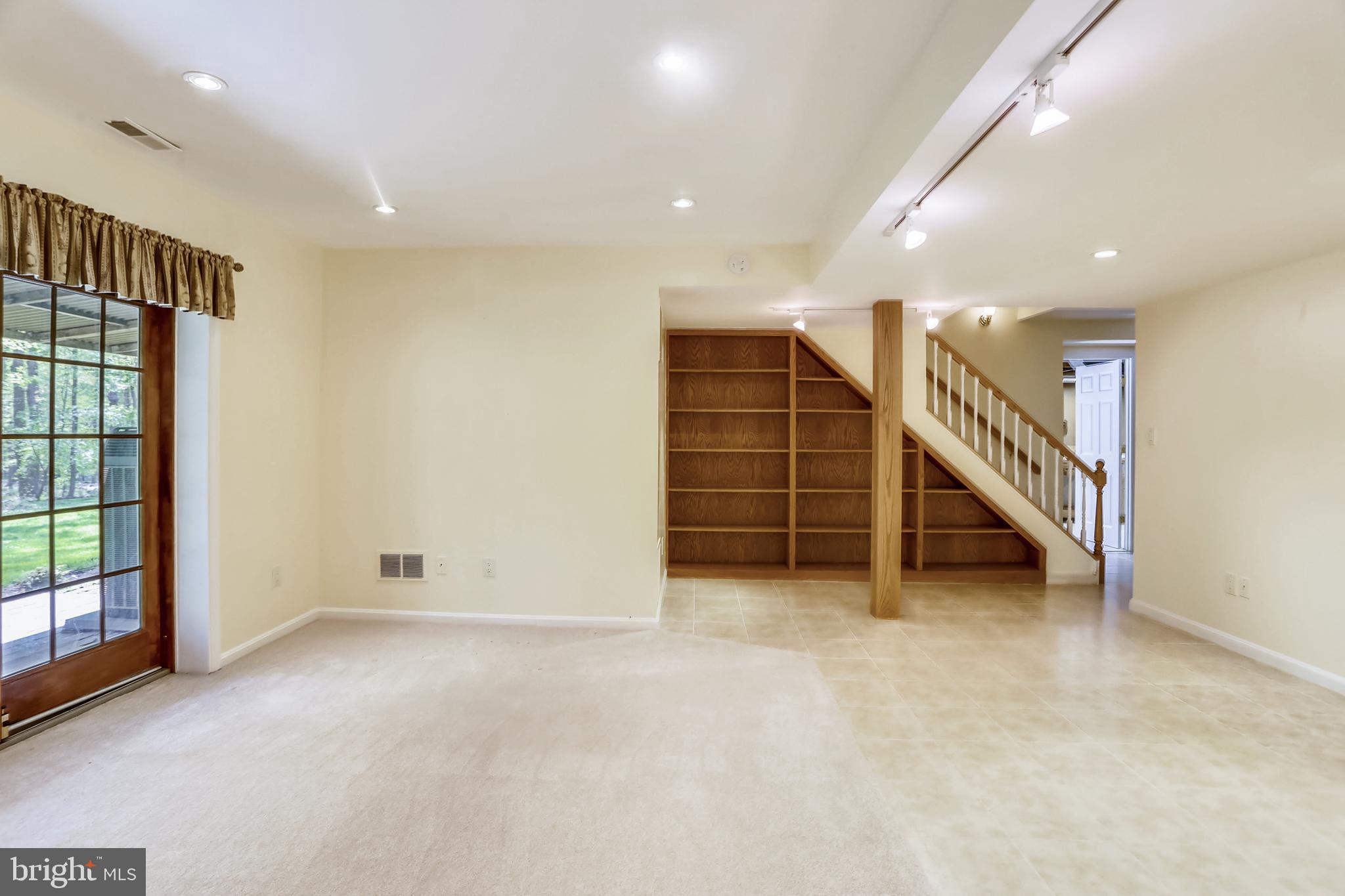 13624 Middlevale Lane Silver Spring, MD 20906 - Photo 27 of 60 Lower Level Family Room with Built Ins