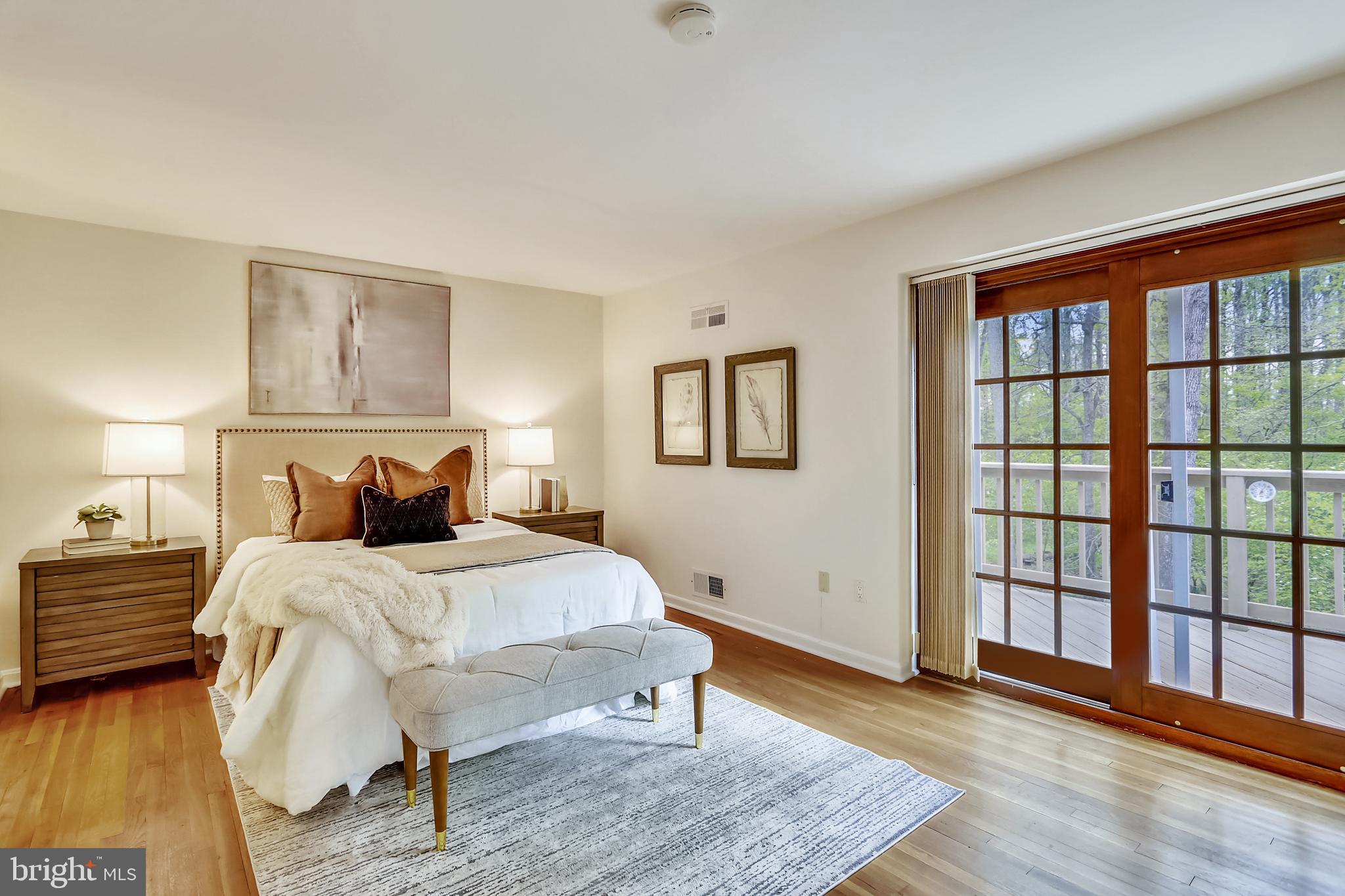 13624 Middlevale Lane Silver Spring, MD 20906 - Photo 28 of 60 Primary Bedroom with Doors to Upper Level Deck