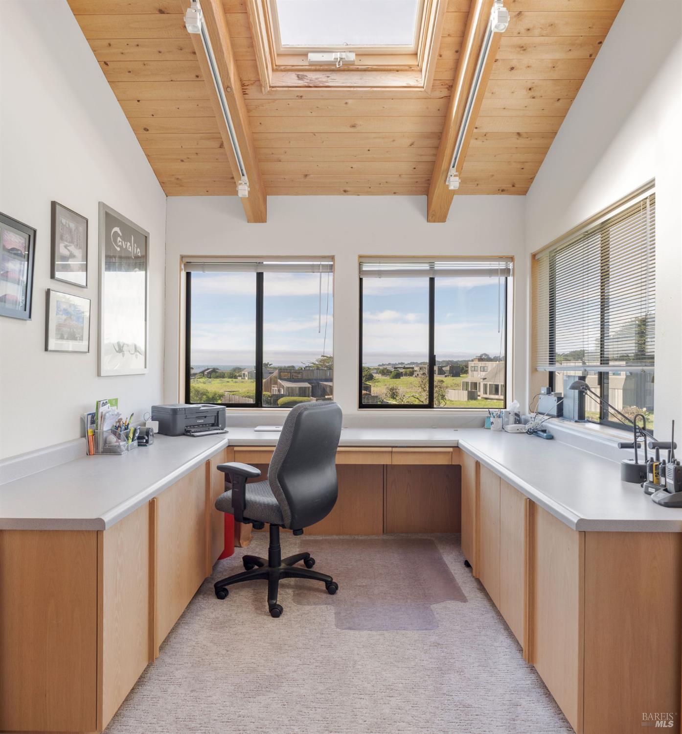 39574 Leeward Road The Sea Ranch, CA 95497 - Photo 17 of 72 a view of a kitchen with kitchen island granite countertop lots of counter top space and stainless steel appliances