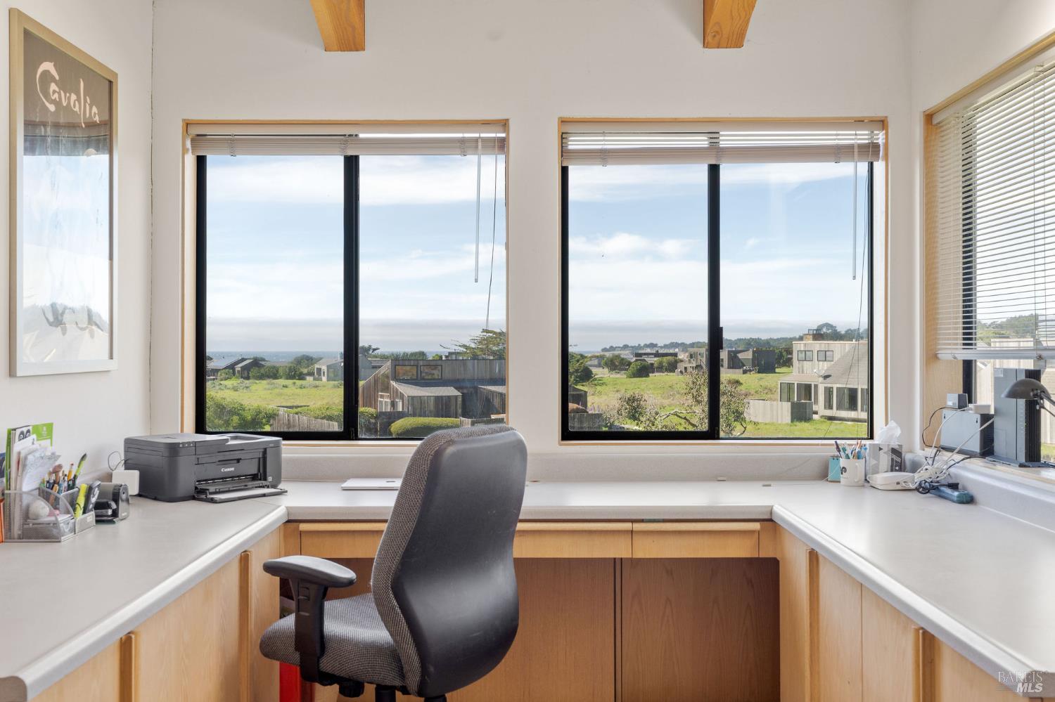 39574 Leeward Road The Sea Ranch, CA 95497 - Photo 18 of 72 a dining room with a large window and table