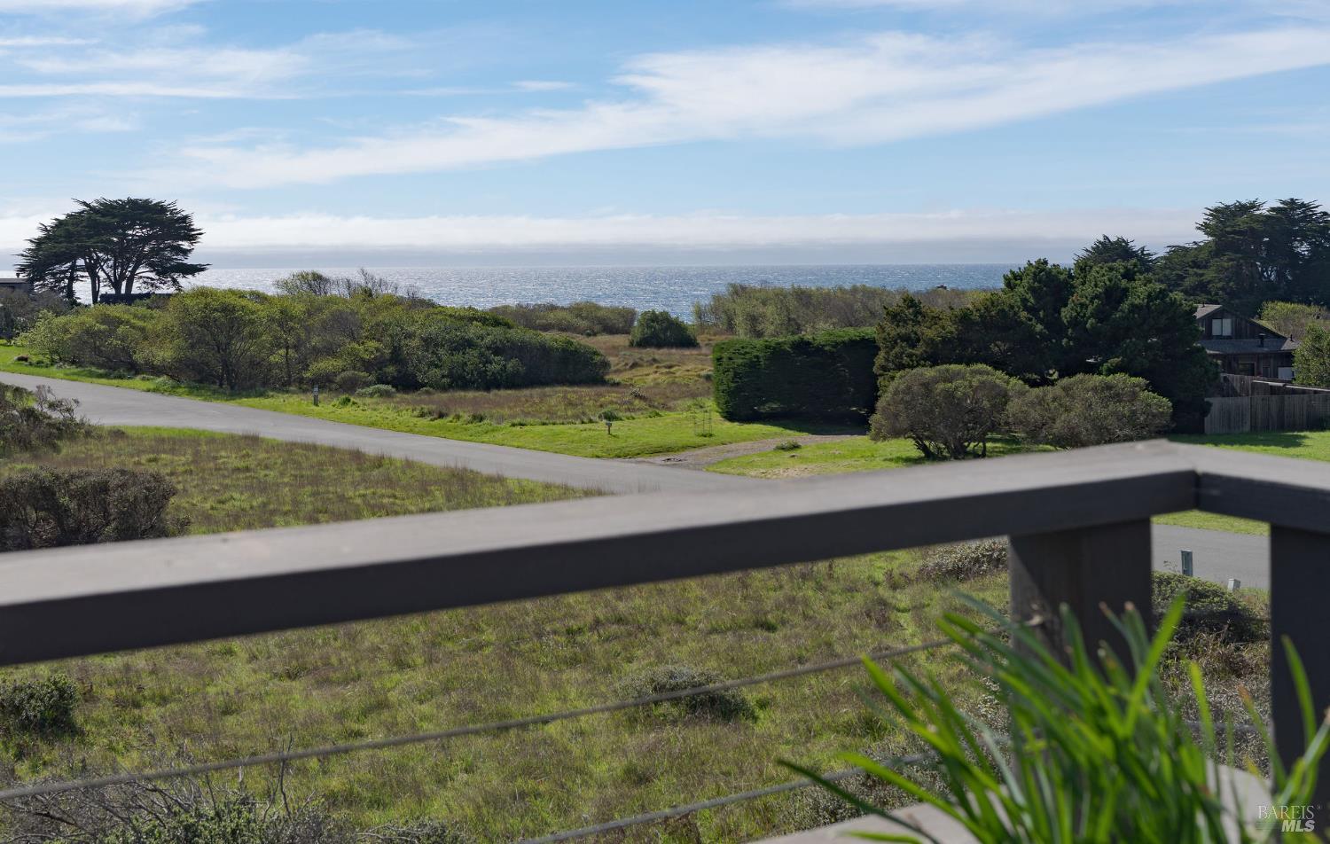 39574 Leeward Road The Sea Ranch, CA 95497 - Photo 19 of 72 a view of a yard with an ocean view