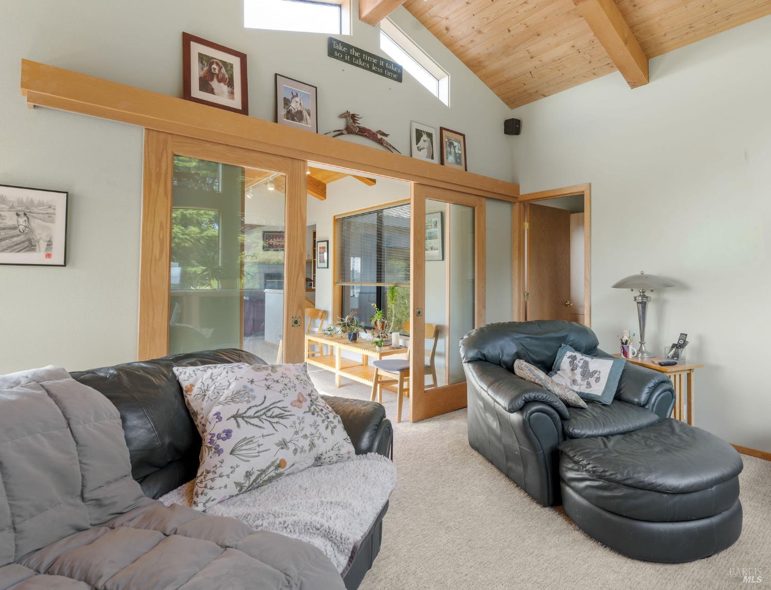 39574 Leeward Road The Sea Ranch, CA 95497 - Photo 22 of 72 a living room with furniture and a large window
