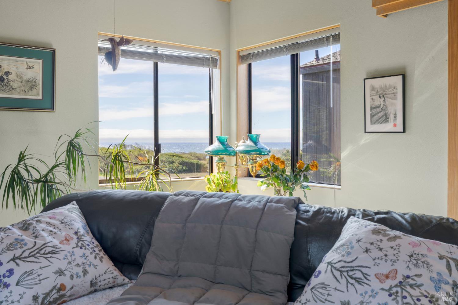 39574 Leeward Road The Sea Ranch, CA 95497 - Photo 24 of 72 a bed sitting in a bedroom next to a window