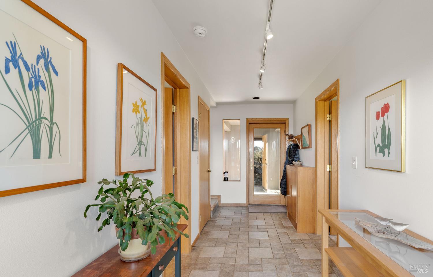 39574 Leeward Road The Sea Ranch, CA 95497 - Photo 36 of 72 a entryway with furniture and a potted plant