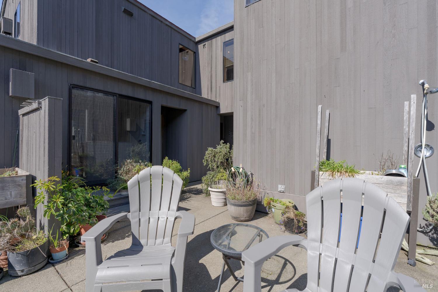 39574 Leeward Road The Sea Ranch, CA 95497 - Photo 49 of 72 a view of a dining room with furniture and potted plants