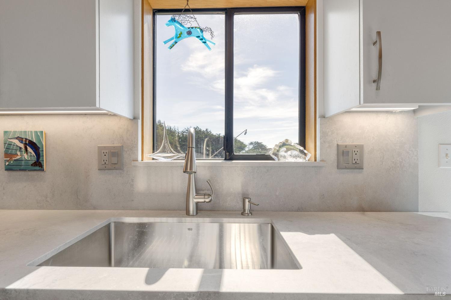 39574 Leeward Road The Sea Ranch, CA 95497 - Photo 7 of 72 a view of a kitchen with a large window