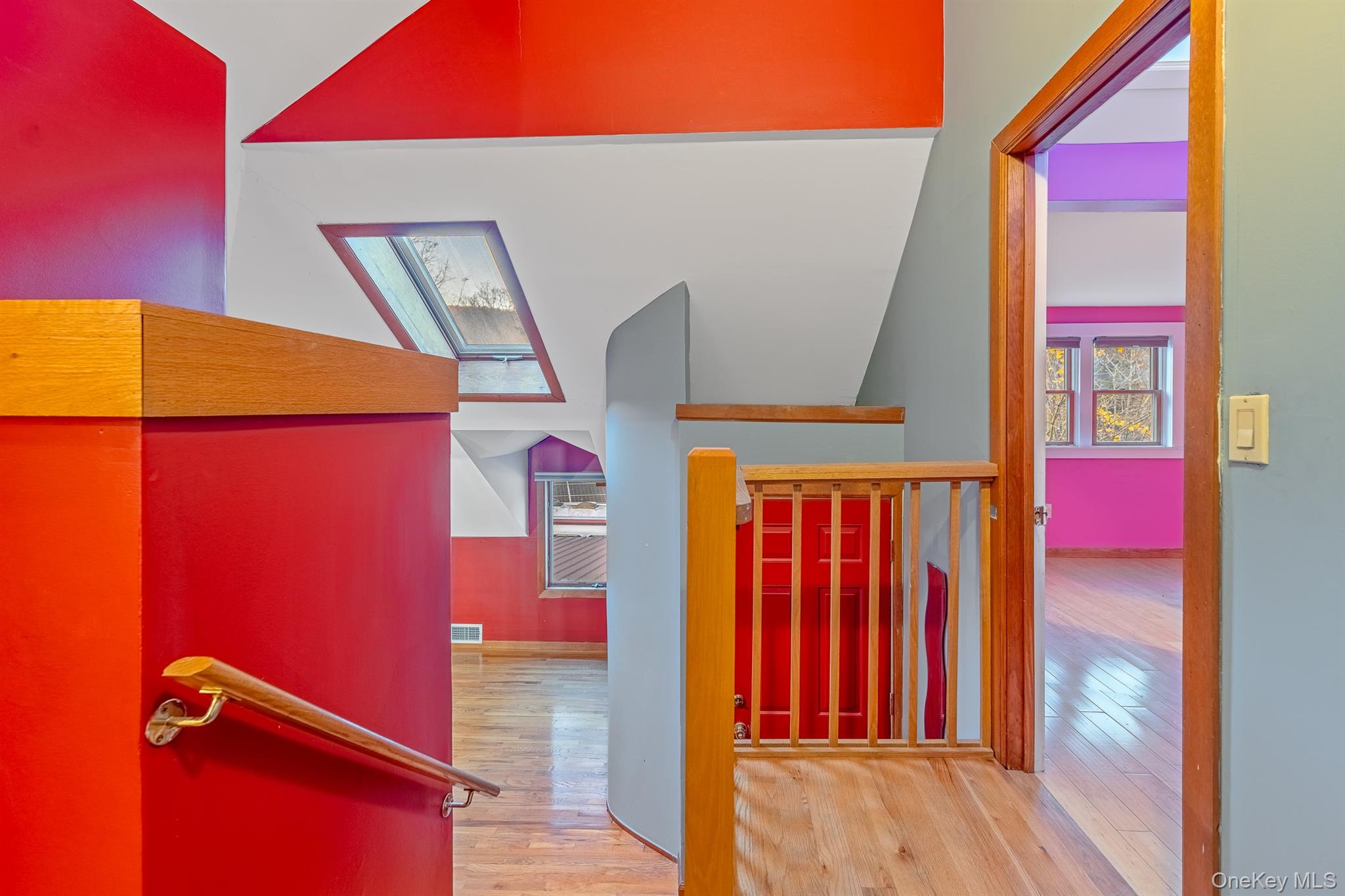 22 Weyant Road Fort Montgomery, NY 10922 - Photo 24 of 26 Hallway featuring light wood finished floors, an upstairs landing, and a skylight