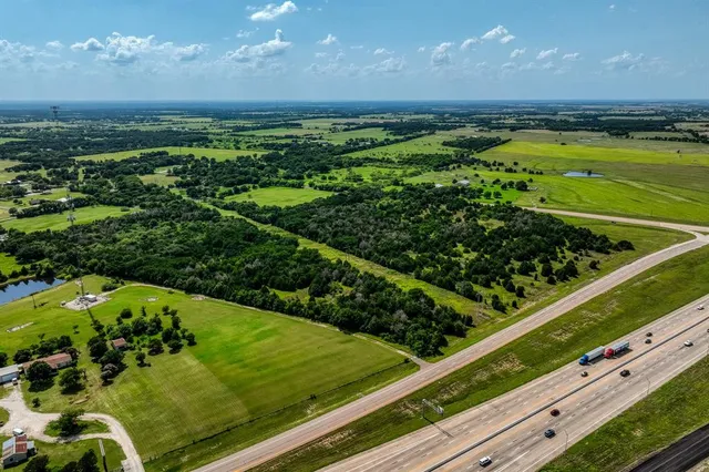 a view of a garden from a balcony