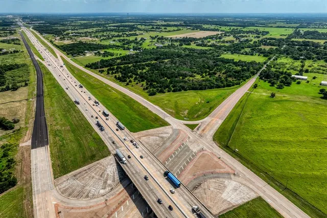 a view of a yard with an outdoor seating
