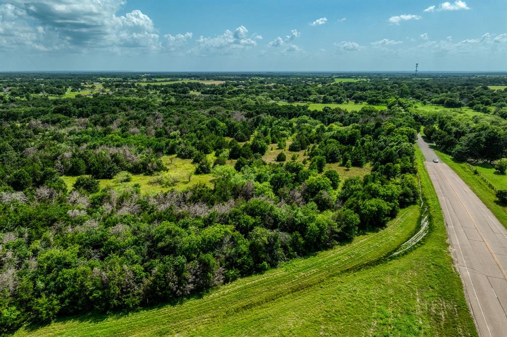18201 Interstate 35 West, TX 76691 - Photo 5 of 22 a view of a garden from a balcony