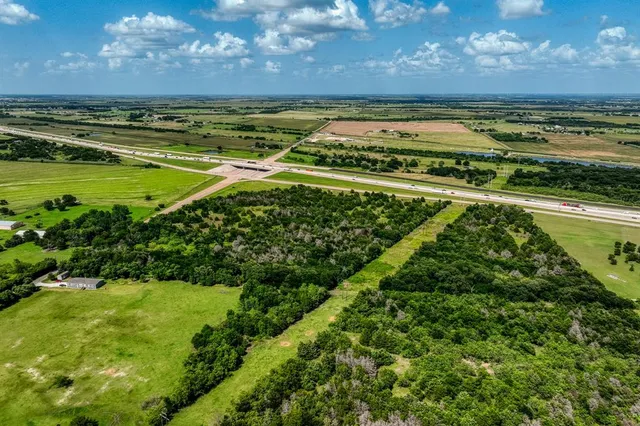 a view of a city with an ocean