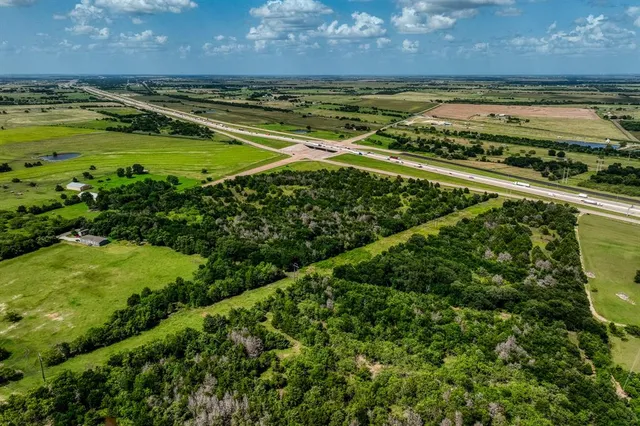 a view of a yard with an outdoor space