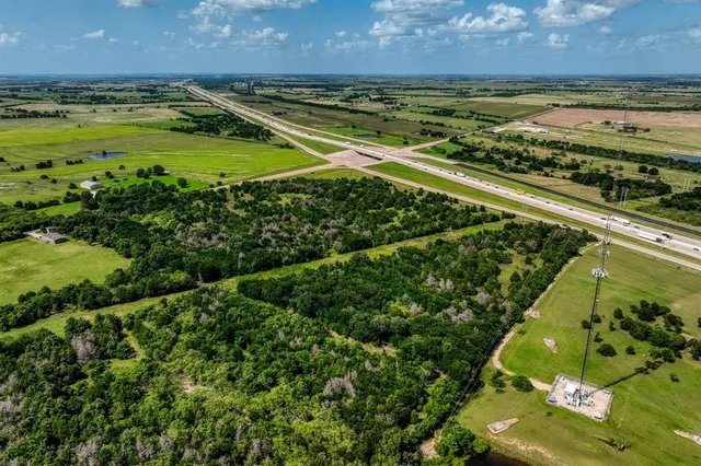 a view of a swimming pool and an outdoor space