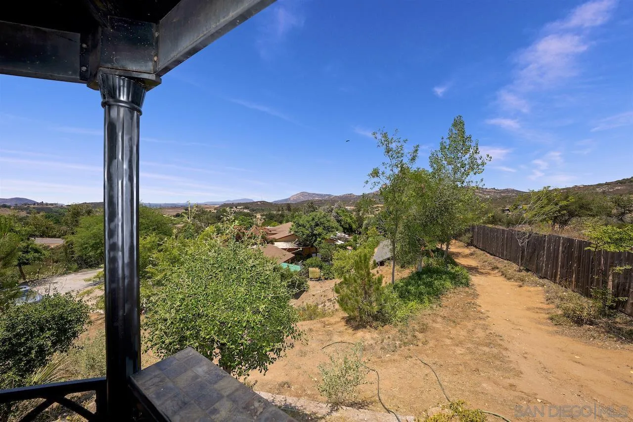 21851 Japatul Road Alpine, CA 91901 - Photo 50 of 52 a view of a yard with a tree