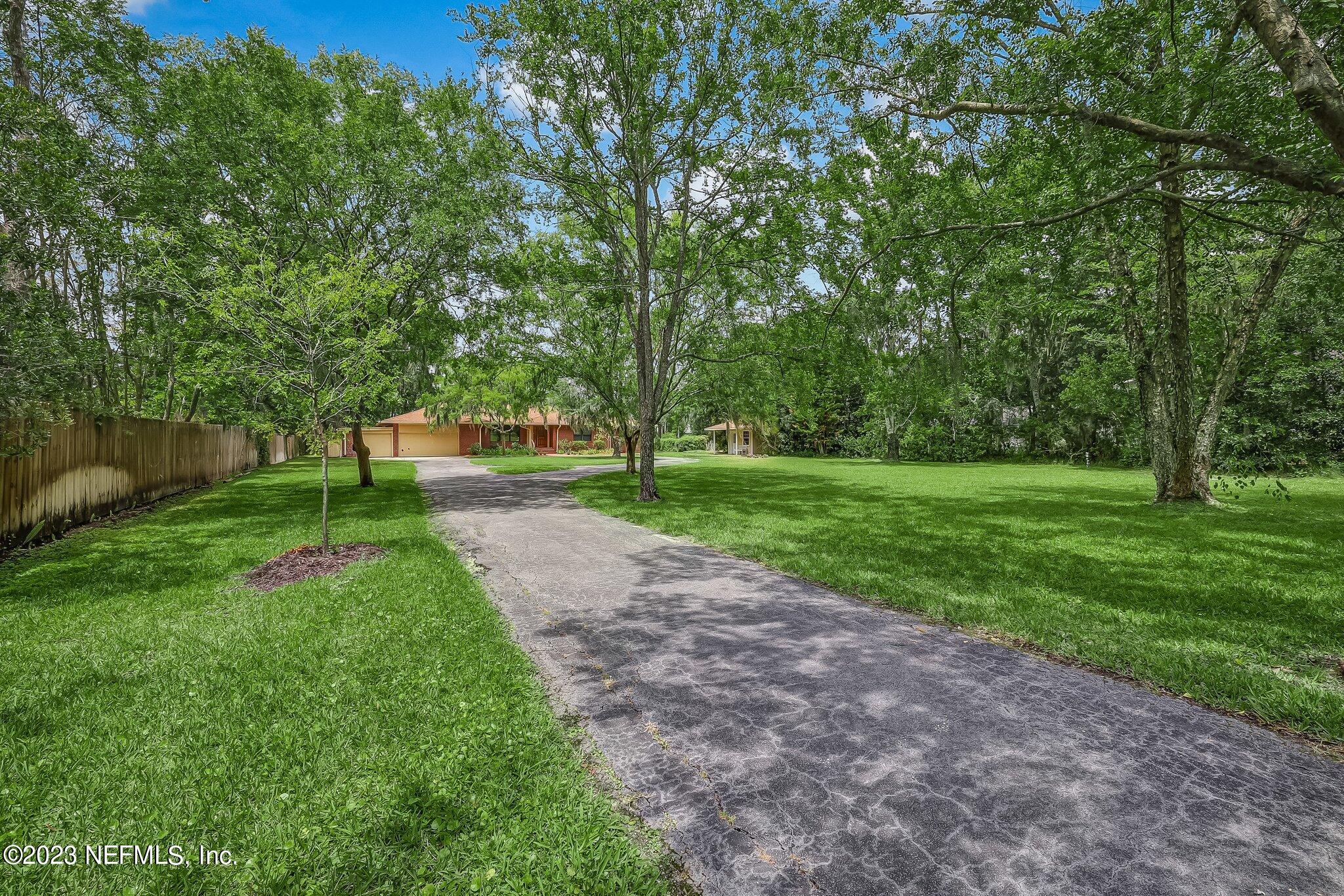 12834 Mandarin Road Jacksonville, FL 32223 - Photo 8 of 51 a view of a park with trees