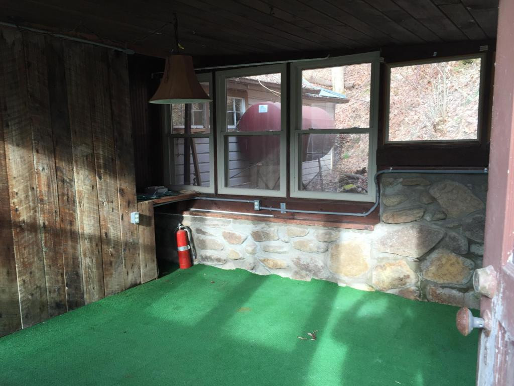 1221 Spivey Mountain Road Erwin, TN 37650 - Photo 5 of 19 Main level enclosed porchstud