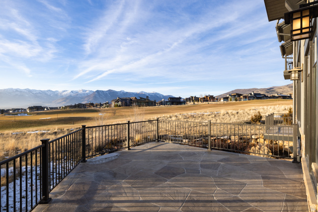 707 Chimney Rock Road, Unit 247 Heber City, UT 84032 - Photo 41 of 64 View of patio featuring a mountain view and a residential view