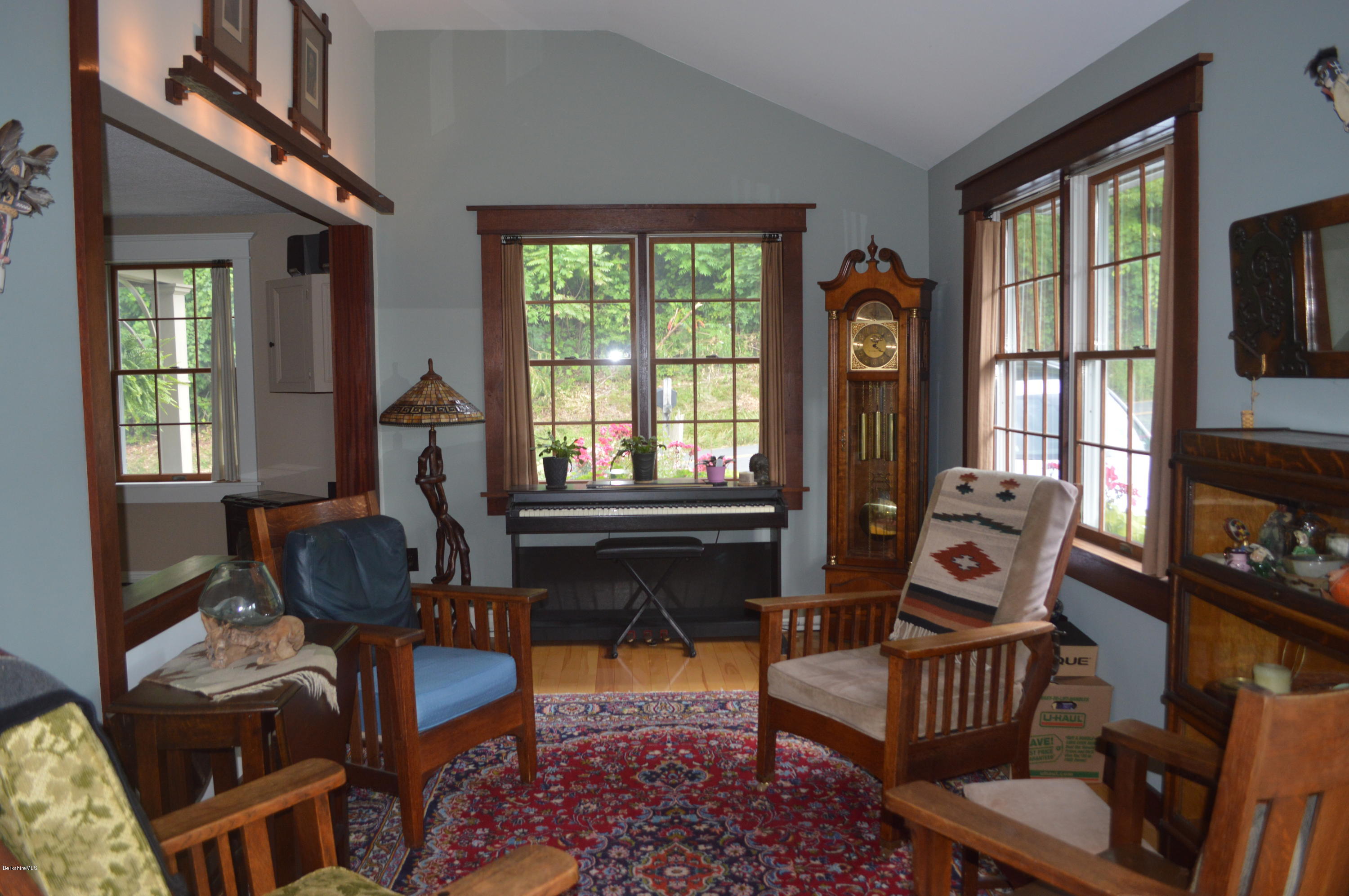 150 Maple Street Lee, MA 01238 - Photo 12 of 57 a living room with furniture and a window