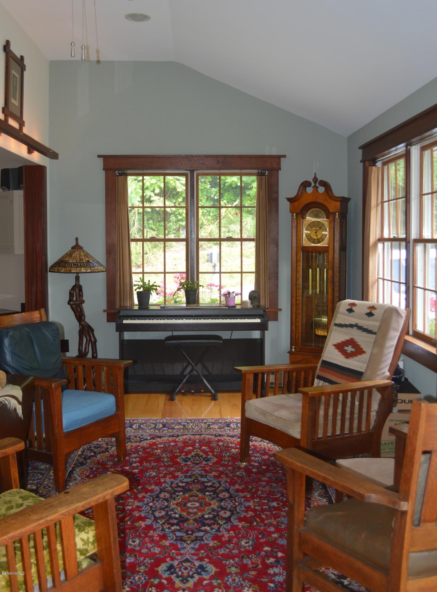 150 Maple Street Lee, MA 01238 - Photo 13 of 57 a living room with furniture and a window
