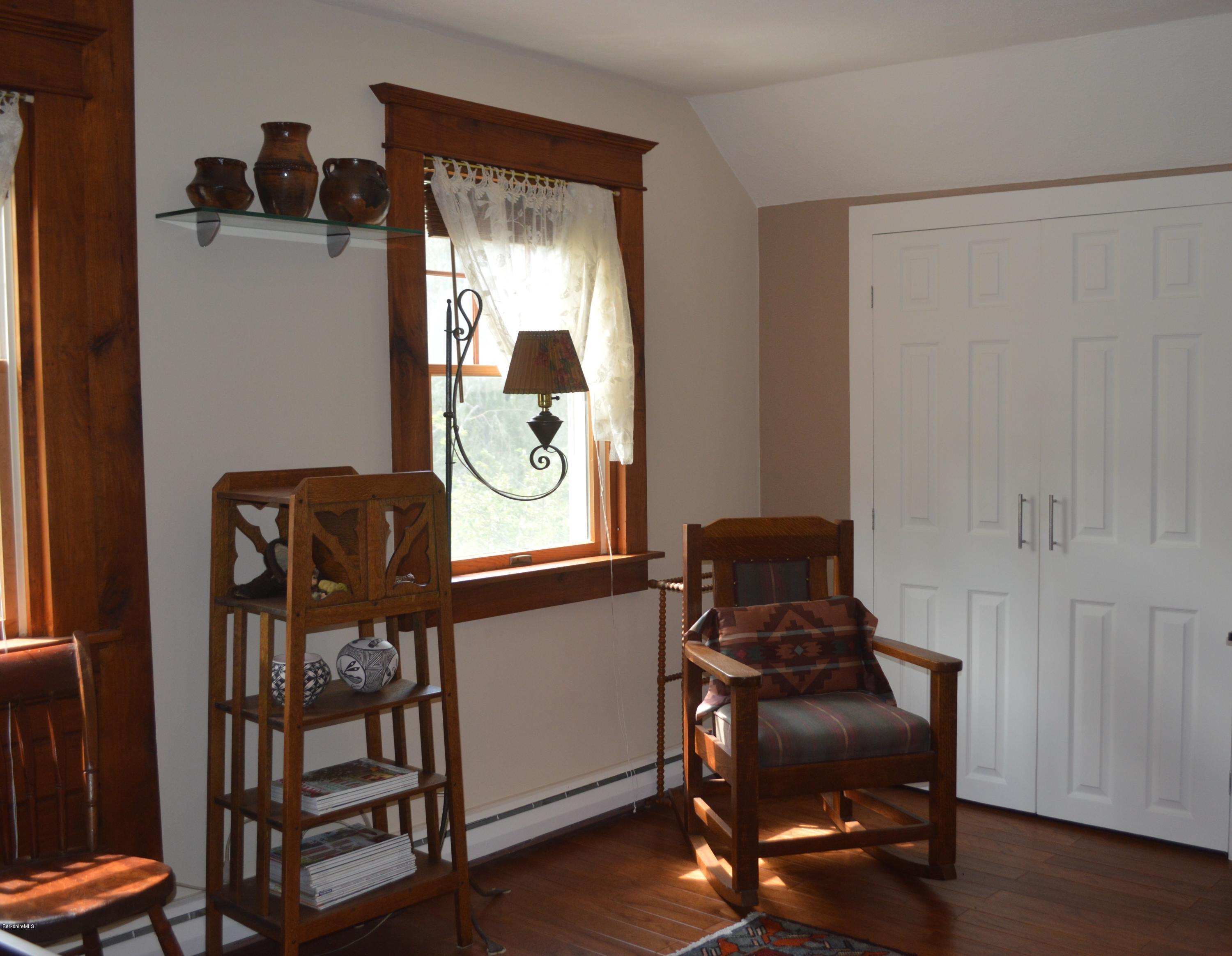 150 Maple Street Lee, MA 01238 - Photo 30 of 57 a view of a workspace with furniture and wooden floor