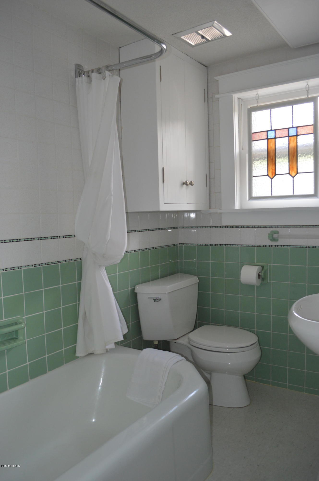 150 Maple Street Lee, MA 01238 - Photo 31 of 57 a bathroom with a toilet sink and window
