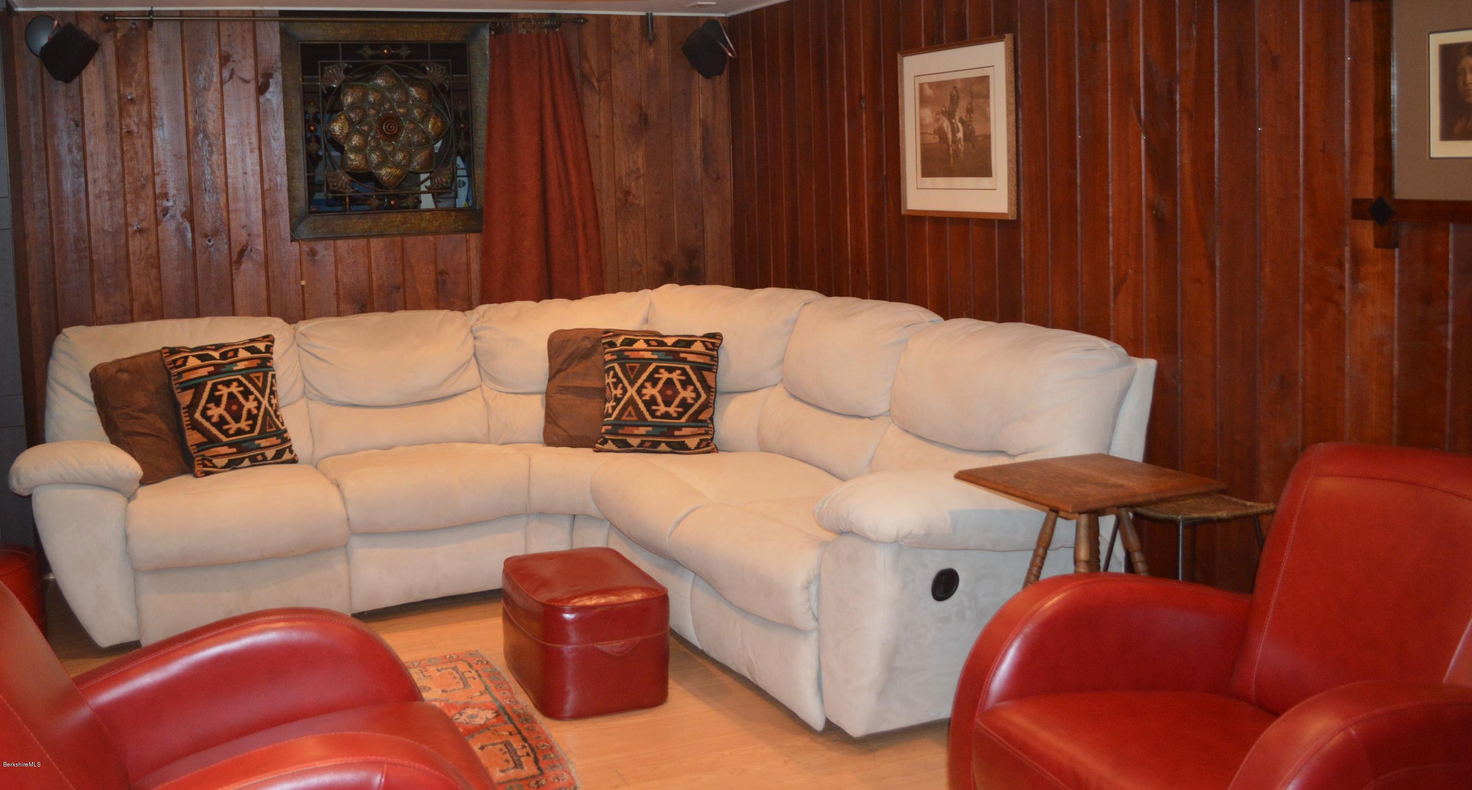 150 Maple Street Lee, MA 01238 - Photo 33 of 57 a living room with furniture and a window