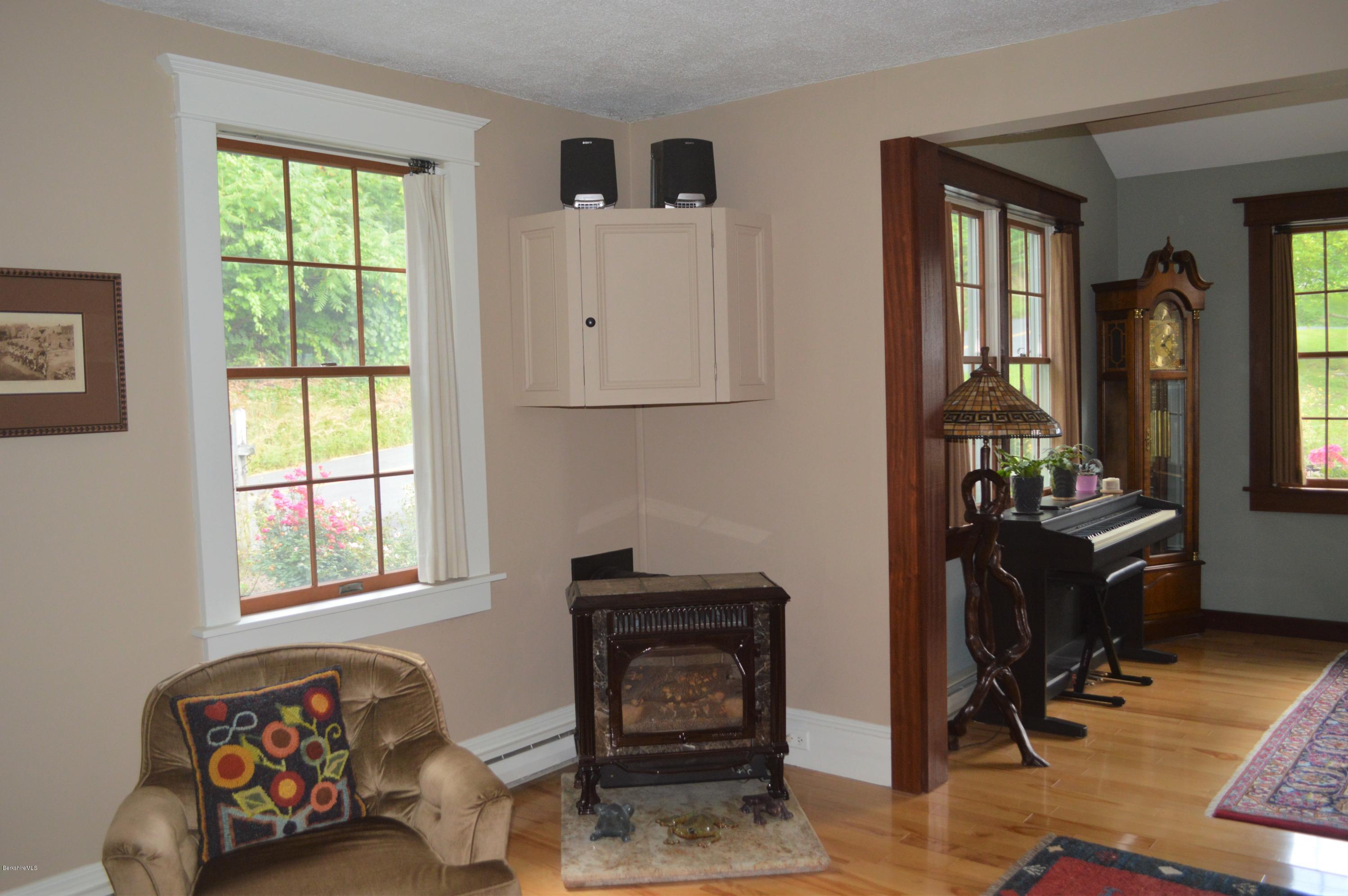 150 Maple Street Lee, MA 01238 - Photo 8 of 57 a living room with furniture and a window