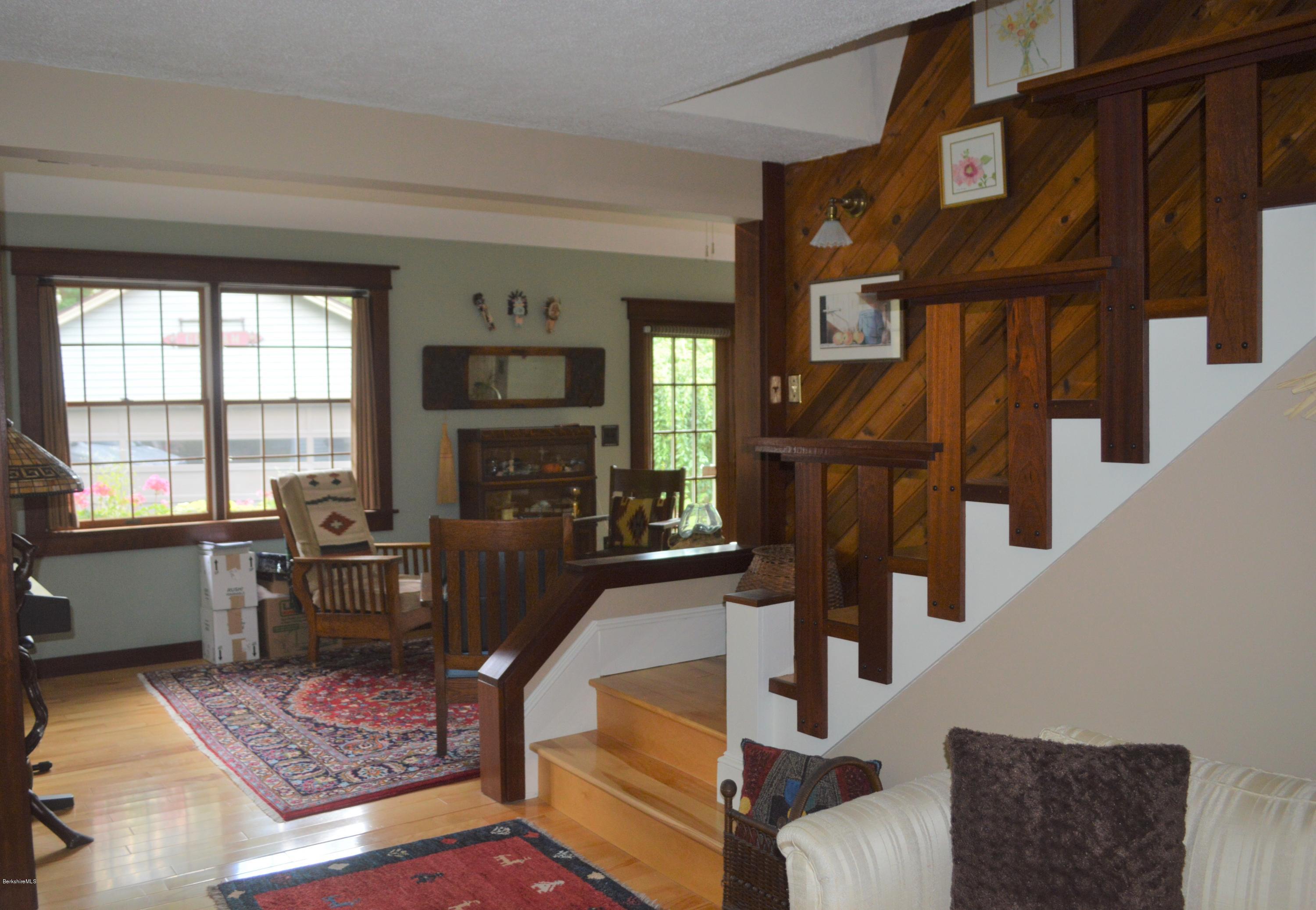 150 Maple Street Lee, MA 01238 - Photo 9 of 57 a living room with furniture or couch and a fireplace