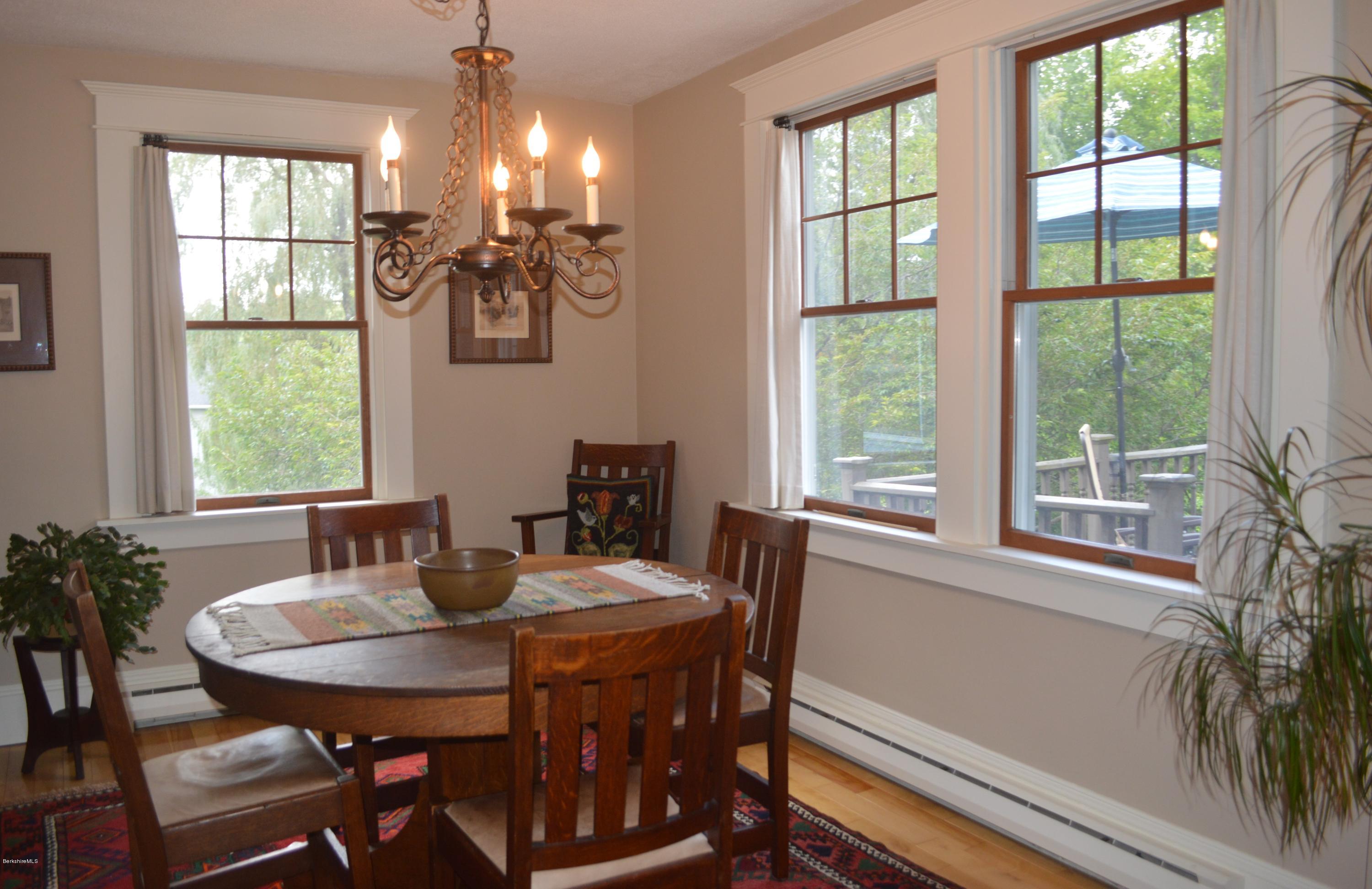 150 Maple Street Lee, MA 01238 - Photo 10 of 57 a view of a dining room with furniture window and outside view